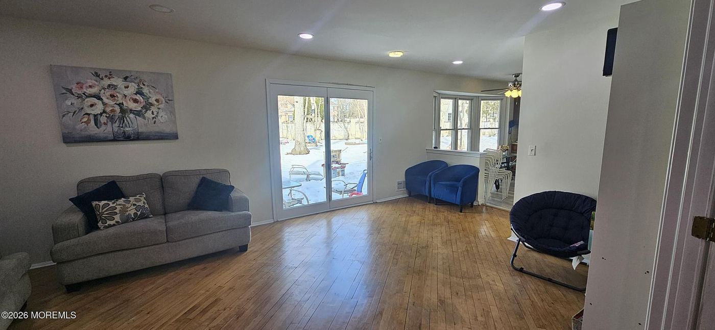 Den with sliding doors to the yard